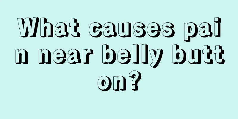 What causes pain near belly button?